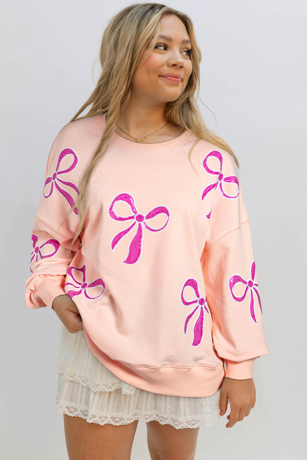 Apricot Pink Sequined Bowknot Drop Shoulder Oversized Sweatshirt