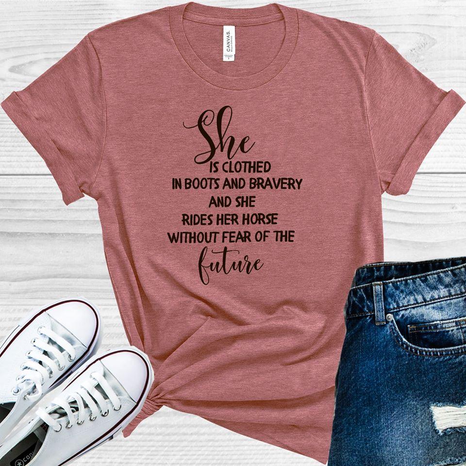 She is Clothed in Boots & Bravery and She Rides Her Horse Without Fear of the Future Graphic Tee