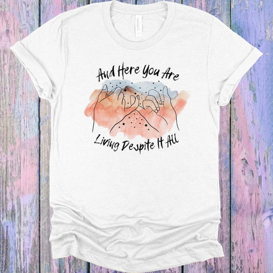 And Here You Are Living Despite it All Graphic Tee