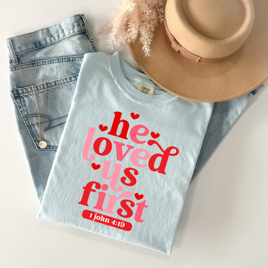 He Loved Us First Graphic Tee