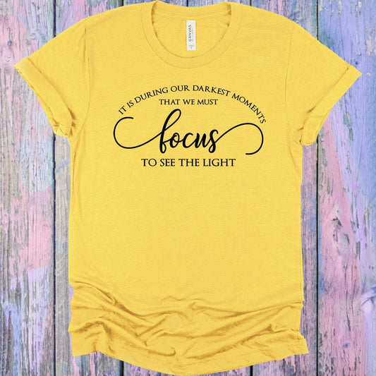 It Is During Our Darkest Moments That We Must Focus to See the Light Graphic Tee