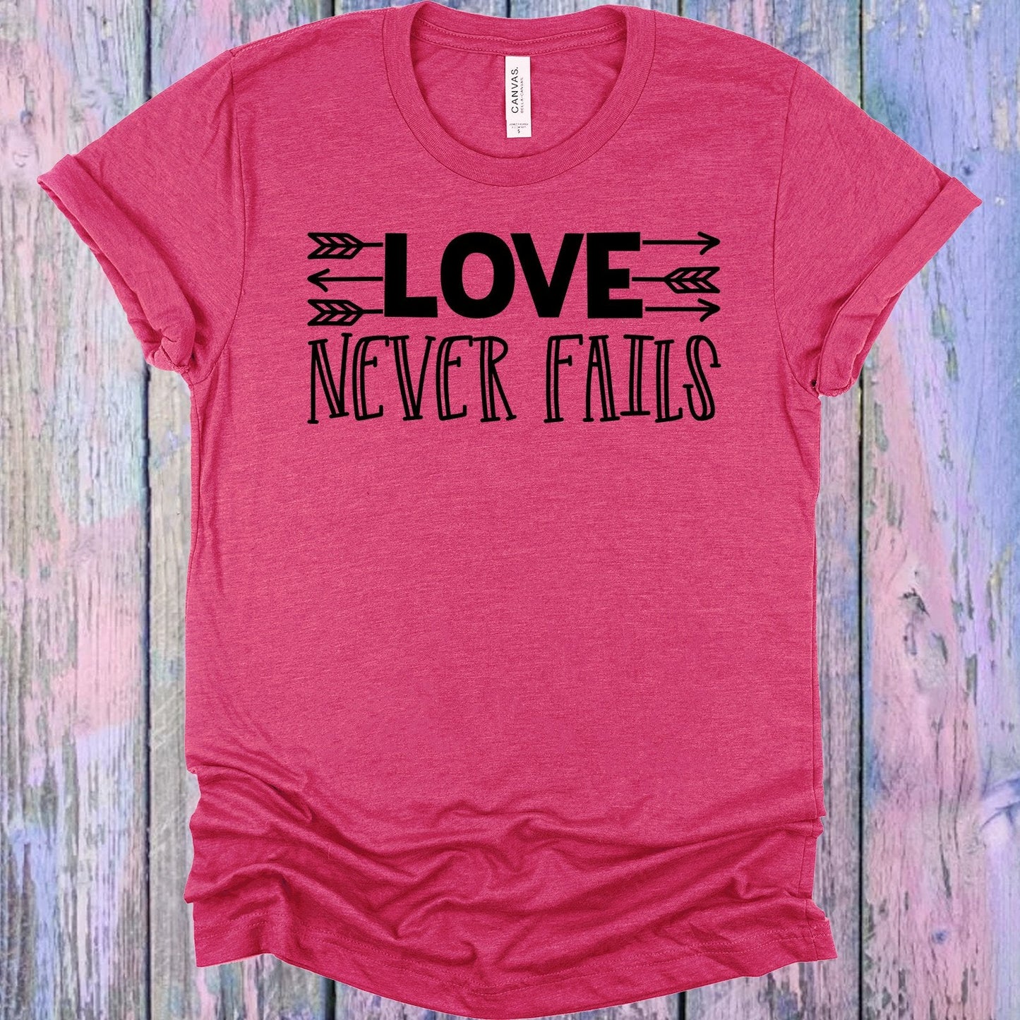 Love Never Fails Graphic Tee
