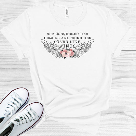 She Conquered Her Demons and Wore Her Scars Like Wings Graphic Tee