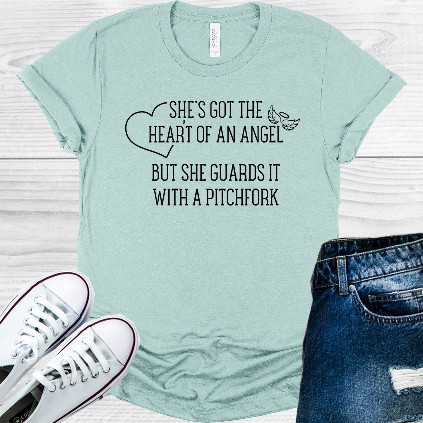 She's Got the Heart of an Angel But She Guards it With a Pitchfork Graphic Tee